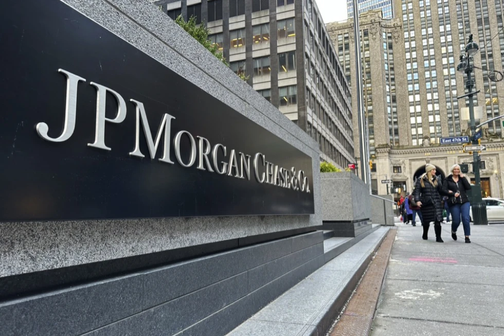 JP Morgan, (AP Photo/Peter Morgan, File)